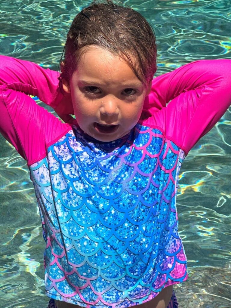 Isla enjoying the pool